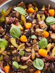 Melanzane saltate con pomodori secchi