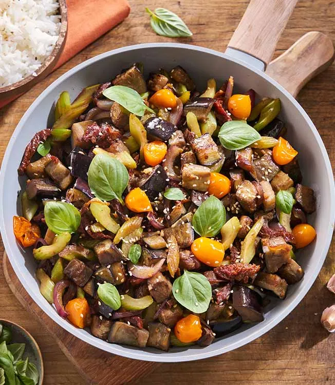 Melanzane saltate con pomodori secchi