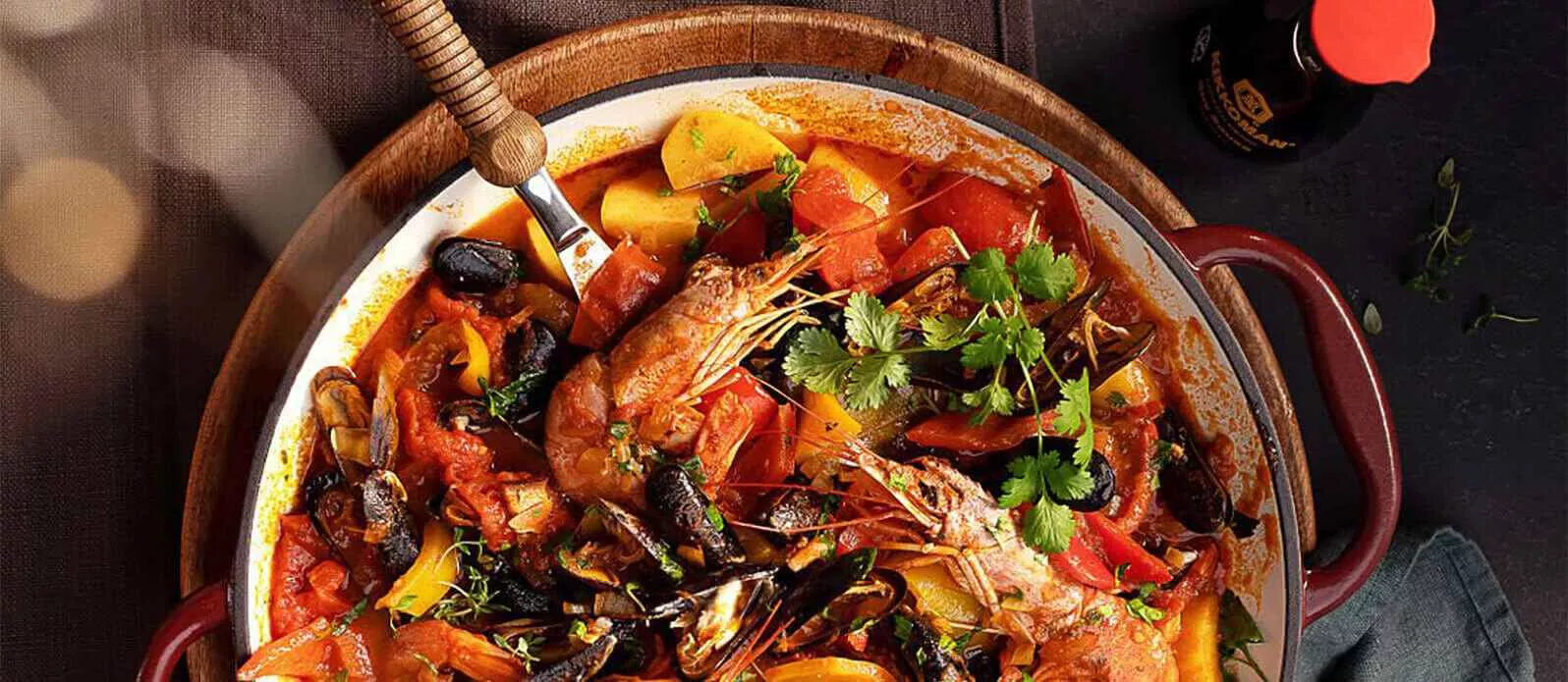 Cataplana con cozze e scampi al forno