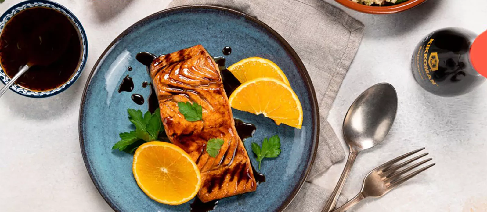 Salmone con marinata di arancia e salsa di soia